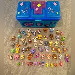 Littlest Petshop set. 50 large 12 small. With carrying case.